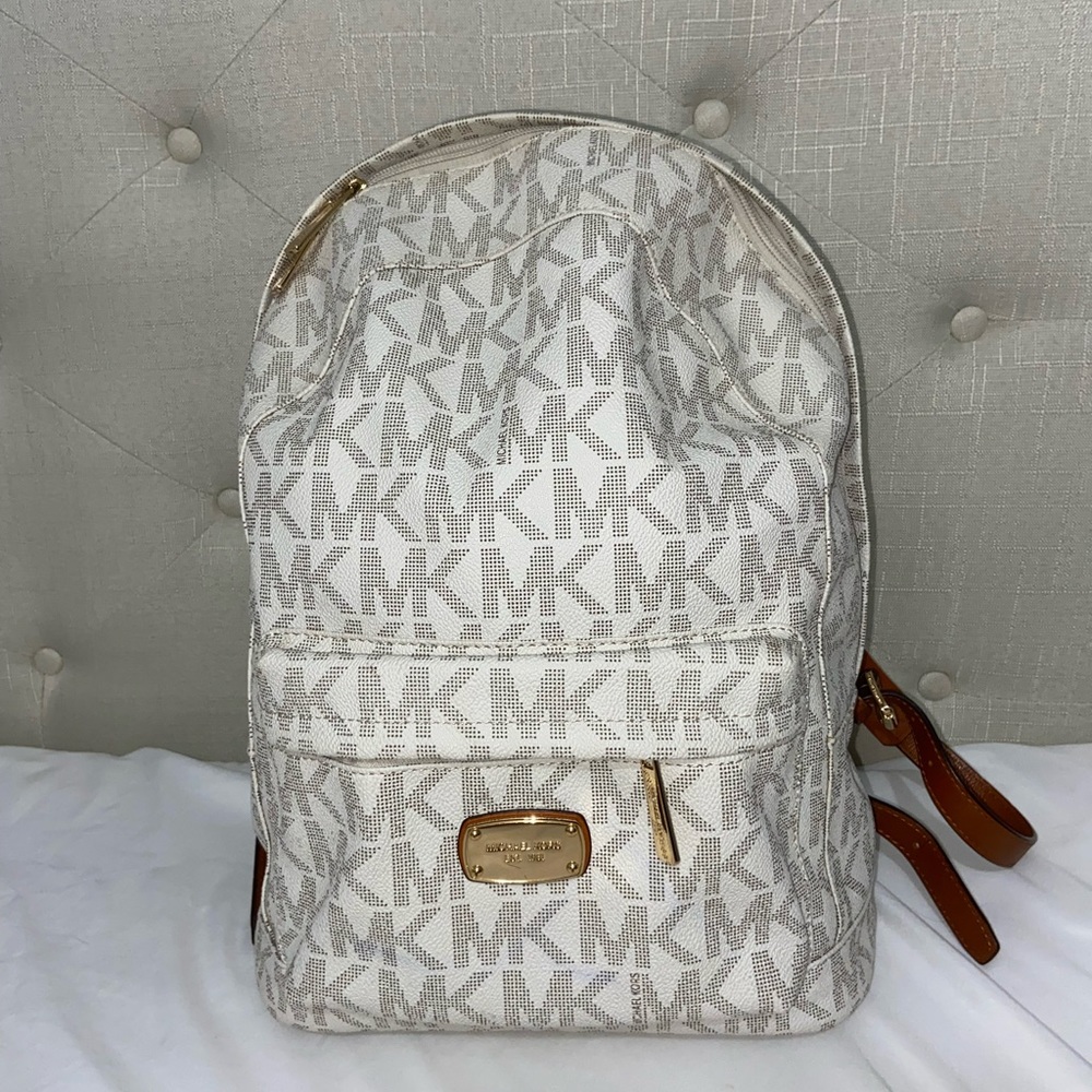 Brown and white MK backpack